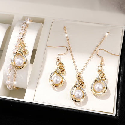 Elegant Gold Bow Pearl Set