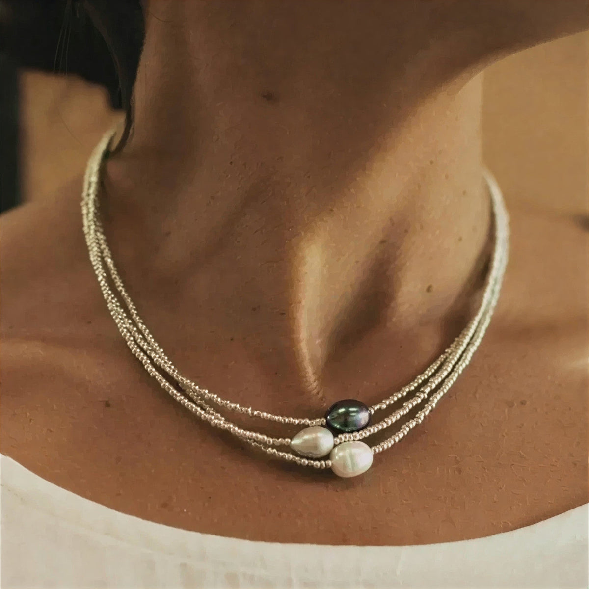Elegant Triple Strand Pearl Necklace